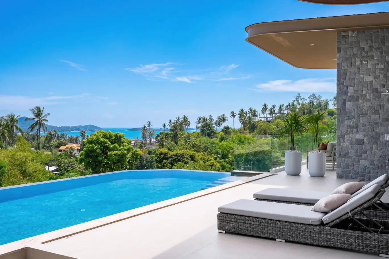 Curved-Roof Hillside Villa with Infinity Pool & Sea Views