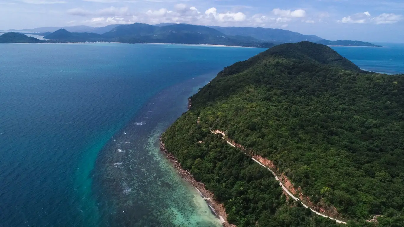 30-Rai West-Facing Seafront Land on Koh Taen with 200m Frontage & Full Sunset Views — view 1