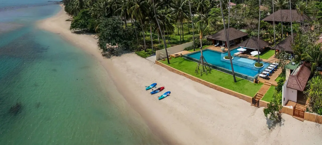 Pavilion-Wrapped T-Pool Beachfront Villa