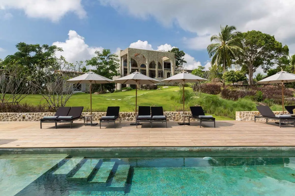 Rock-Clad Mediterranean Hillside Villa with Twin Pools
